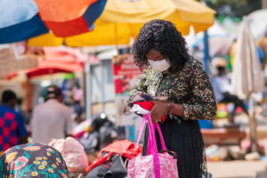 Women at market wearing face mask